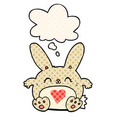 cute cartoon rabbit with love heart and thought bubble in comic book style