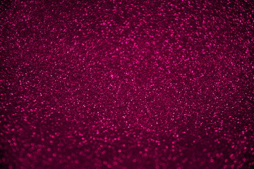 Plastic pink sparkling background. Blured glitter background. Holiday background. Festive concept.