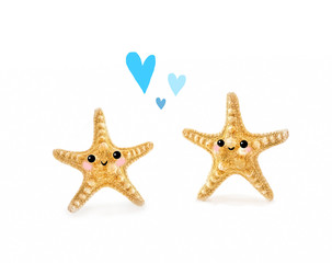 Fototapeta na wymiar lovely couple starfish on white background. baby starfish cute kawaii style face. create concept of nature relaxation, recreation, travel, love and friendship. close up, soft selective focus