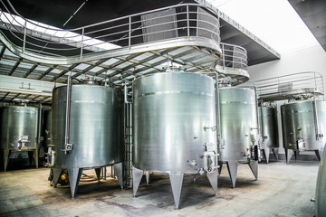 Metallic fermentation tanks in winery Vina Undurraga in Talagante Chile.