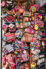 Fototapeta na wymiar Traditional handcrafts on the market in main street of Uyuni, Bolivia.