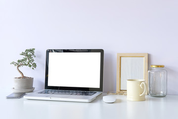 Fototapeta premium Workspace desk and laptop. copy space and blank screen. Business image, Blank screen laptop and supplies.