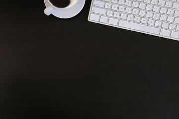 Top view office stuff with notepad, laptop and coffee cup mouse notepad shot.blank screen mobile phone and supplies on white desk workspace and copy space.