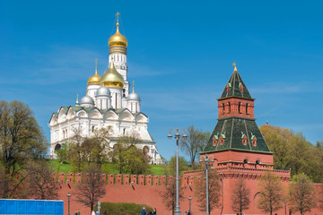 Fototapeta na wymiar Moscow, Russia - May 6, 2019: View of the Moscow Kremlin and cathedrals on Cathedral Square on a summer day