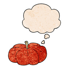 cartoon pumpkin and thought bubble in grunge texture pattern style