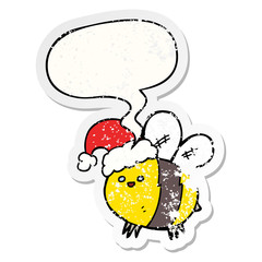 cute cartoon bee wearing christmas hat and speech bubble distressed sticker