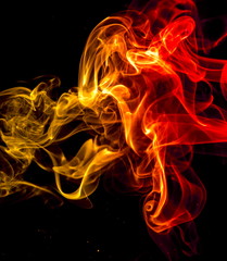 Colored smoke on black background