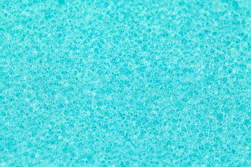 Fototapeta na wymiar Macro close up of blue sponge for washing.Inside of blue sponge for washing. extreme close up