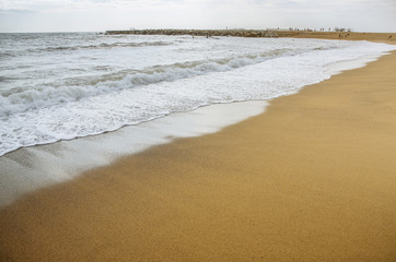 Beautiful beach. Summer sand and sun. Vacation concept. Travel and holiday photo. Barceloneta in the city.