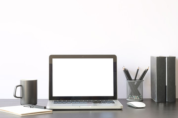 Workspace desk and mockup laptop. copy space and blank screen. Business image, Blank screen laptop and supplies.