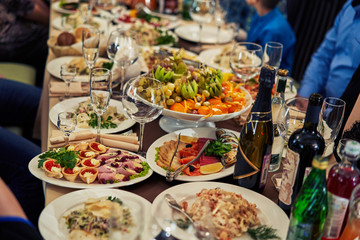 banquet table with drinks and snacks