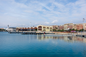 The port of Valencia in the evening at a time when there are no water waves
