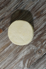 Beautiful, healthy and tasty feta cheese on a beautiful textured wooden background