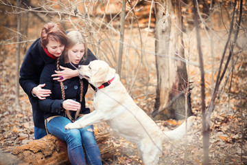 Fototapeta premium Young girl on a walk in the autumn