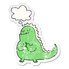 cartoon dinosaur and thought bubble as a distressed worn sticker