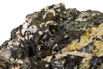 Macro of a mineral stone Vesuvianite on a white background