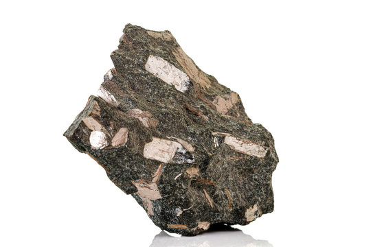 Macro stone mineral Diopside Calcite Magnetite on a white background