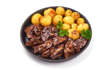 Fried Chicken Livers with baked potatoes, Restaurant food, close-up, isolated on white background