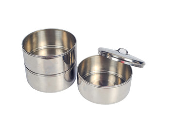 Stainless steel food carrier or tiffin food container on white background.