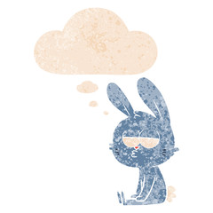 cute cartoon rabbit and thought bubble in retro textured style