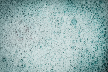 Soap bubbles background- suds liquid