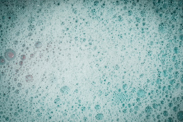 Soap bubbles background- suds liquid