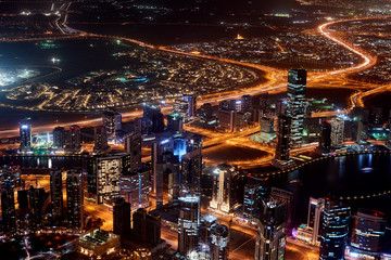 Dubai Cityscape at sunset blue hour from tallest building view