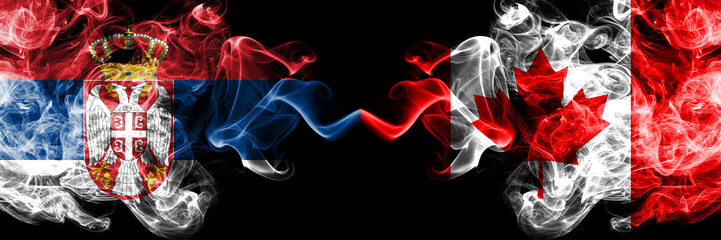 Serbia vs Canada, Canadian smoky mystic flags placed side by side. Thick colored silky smokes...