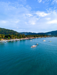 wide Aerial landscape shot of Port Barton beach at sunset, Palawan, Philippines