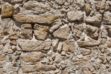 old stone wall of stones