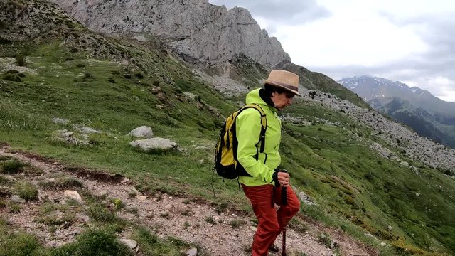 hiker woman with view of Tena Valley in The Pyrenees, Formigal,  Huesca, Spain