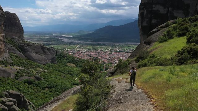Aerial 4k drone clip with people hiking in Meteora	