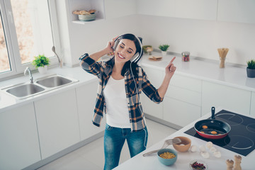 Top above high angle view photo lovely cute trendy stylish person people supper dieting healthy food playlist headset feel rejoice pleasure glad modern checkered shirt plaid denim jeans apartment