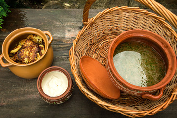 Close up, macro. National Ukrainian lunch in the home garden. Food is served in traditional...