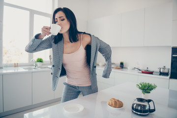 Close up photo beautiful she her lady hot beverage swallow sip croissant table late job quickly...