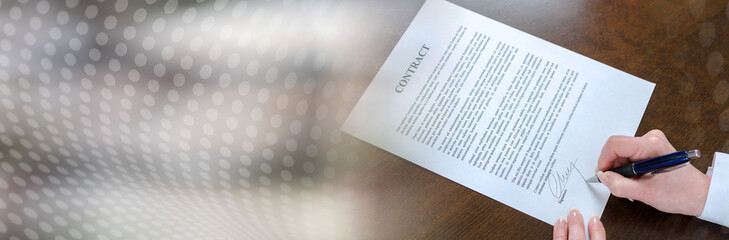 Obraz premium Businesswoman signing a contract (Lorem Ipsum Text); panoramic banner