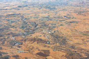 Fototapeta premium Desert relief viewed from an aircraft