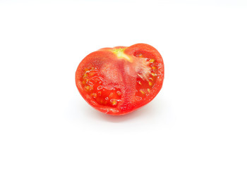 Cut red tomatoe on a white background