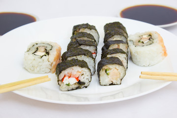 Japanese cuisine, rice sushi and fish - closeup