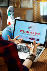 annoyed modern hipster experiencing computer fault