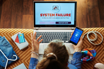 woman having data failure on pc and calling voice tech service