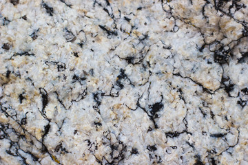 The texture of the granite surface of the stones - stone background