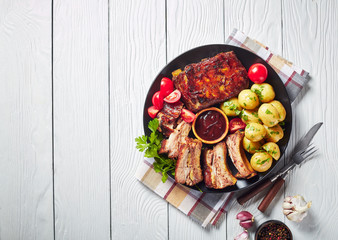 grilled pork ribs topped with barbecue sauce