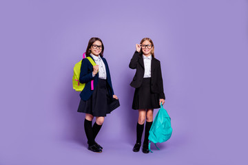 Full length photo of charming classmates hold hand wear trendy stylish eyewear eyeglasses isolated...
