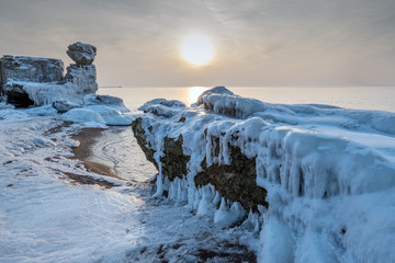 Ice on abandoned military fortifications on Baltic sea coast near Liepaja, Latvia.