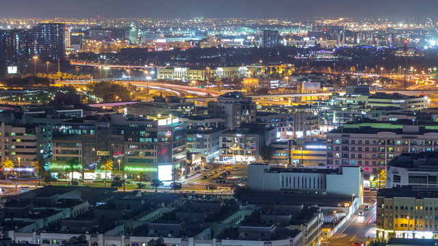 Aerial view of neighbourhood Deira with typical buildings night timelapse, Dubai, United Arab Emirates © neiezhmakov