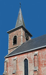 Tower of the rural church in Meusegem Kobbegem Flanders Belgium