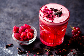 Close up of a tasty flavored cocktail containing fresh fruits