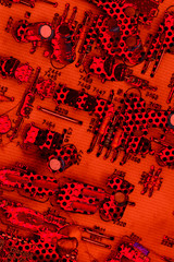 Electronic Circuit Board Detail Red and Black Background