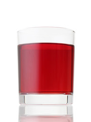 Glass of red drink isolated on white